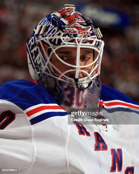 Goalie Henrik Lundqvist of the New York Rangers takes a breather during a NHL game against the Detroit Red Wings on October 18, 2008 at Joe Louis...