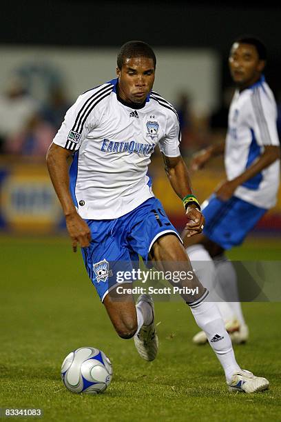 Ryan Johnson of the San Jose Earthquakes dribbles the ball against the Kansas City Wizards during the game at Community America Ballpark on October...