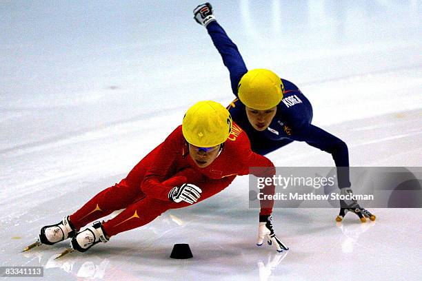 Yang Zhou of China leads Ba-Ra Jung of South Korea in the 1500 meter final during the Samsung ISU World Cup Short Track at the Utah Olympic Oval...