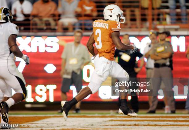 Running back Chris Ogbonnaya of the Texas Longhorns scores a touchdown untouched against the Missouri Tigers in the first quarter on October 18, 2008...