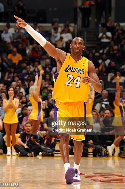 Kobe Bryant of the Los Angeles Lakers gestures after scoring a basket during the game against Regal FC Barcelona against the Los Angeles Lakers at...