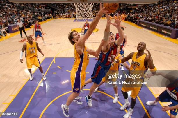 Daniel Santiago of Regal FC Barcelona has his shot challenged by Pau Gasol of the Los Angeles Lakers at Staples Center on October 18, 2008 in Los...