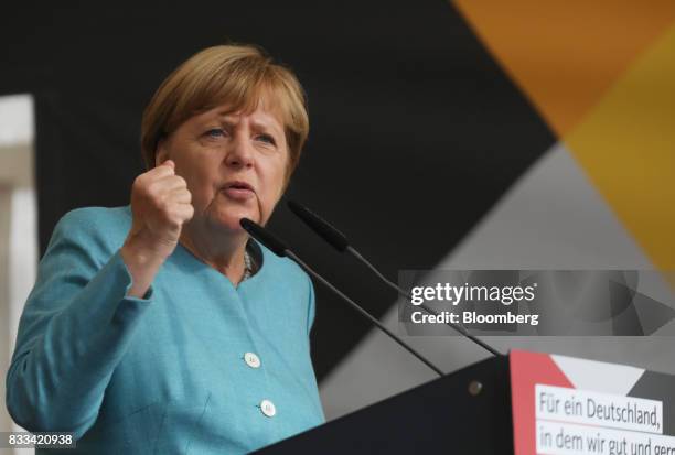 Angela Merkel, Germany's chancellor and Christian Democratic Union leader, gestures while speaking during an election campaign stop in Koblenz,...