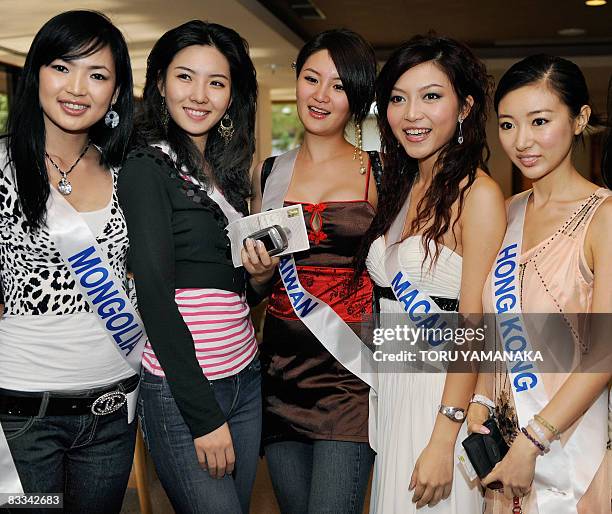 Representatives for the Miss International Beauty Pageant 2008, L-R: Ochgerel Khulangoo of Mongolia, Kim Min-Jung of South Korea, Yu Ting Yen of...