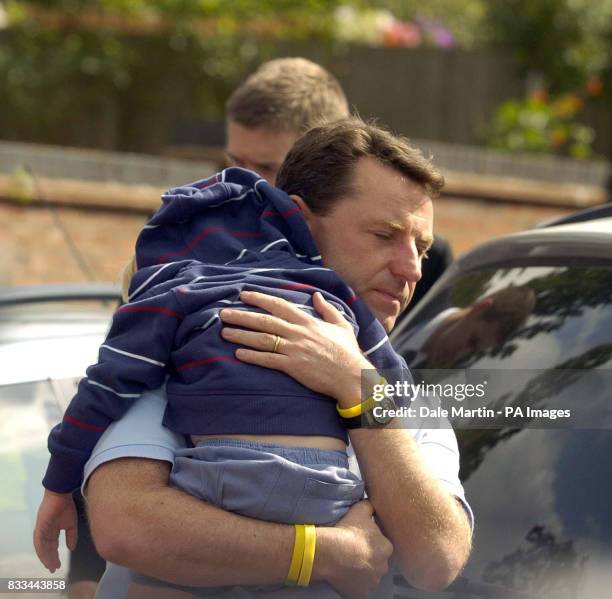 Gerry McCann, father of Madeleine, arrives back home in Rothley, Leicestershire, today, with son Sean.