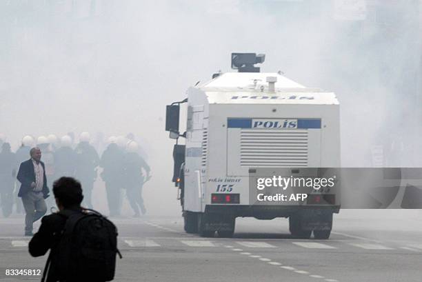 Tear gas used by riot police to disperse Pro-Kurdish Democratic Society Party supporters demonstrating to call attention to the Ergenekon case in...