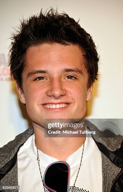 Actor Josh Hutcherson arrives at the benefit grand opening of celebrity vehicle customization shop Galpin Auto Sports on October 18, 2008 in Van...