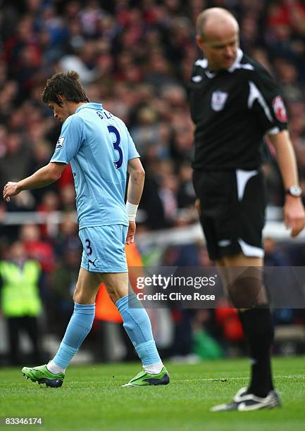 Gareth Bale of Tottenham Hotspur walks off after being sent off by referee Lee Mason during the Barclays Premier League match between Stoke City and...