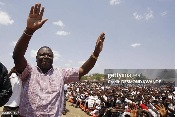 Zimbabwean opposition Movement for Democratic Change leader and Prime Minister-designate Morgan Tsvangirai greets supporters at a rally in Masvingo...