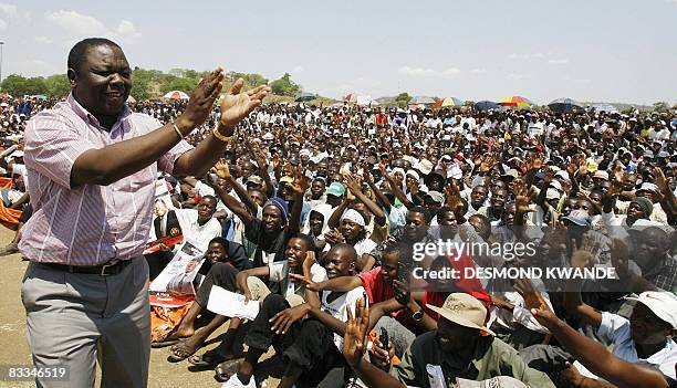 Zimbabwean opposition Movement for Democratic Change leader and Prime Minister-designate Morgan Tsvangirai greets supporters at a rally in Masvingo...