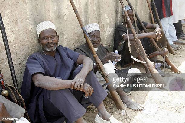 Traditional hunters sit beside their dane guns at the historic first Talakawa Summit in Nigeria in Dutse, Jigawa State on October 18, 2008. Top...