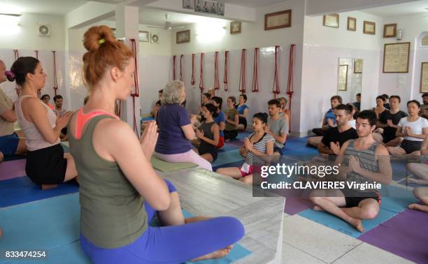 Lesson of Iyengar yoga taught by Usha Devi in the ashram Omkarananda Ganga Sadan on march 29,2017 in Rishikesh, India.