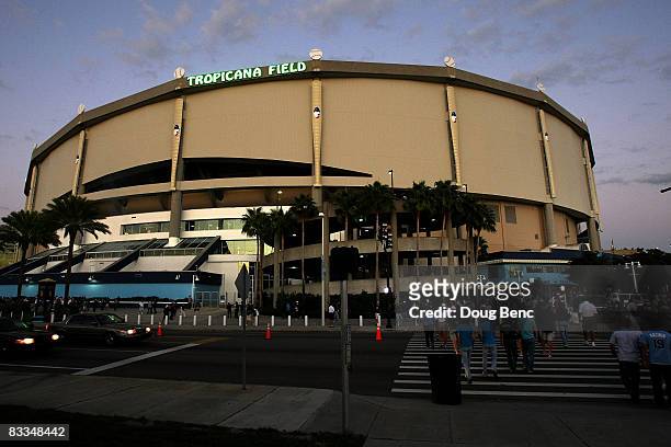 Fans walk outside of Tropicana Field before game seven of the American League Championship Series between the Boston Red Sox and the Tampa Bay Rays...