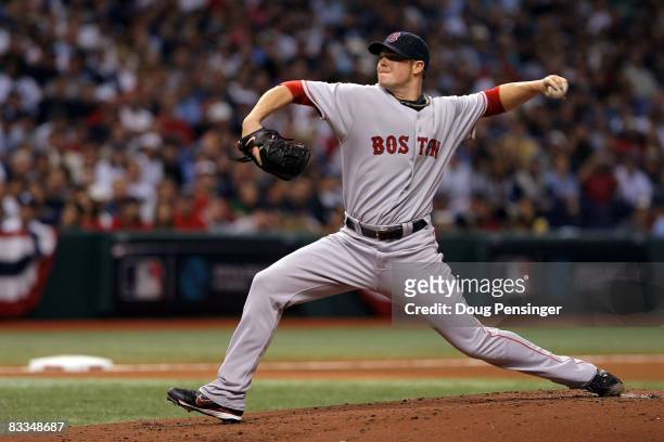 Starting pitcher Jon Lester of the Boston Red Sox delivers against the Tampa Bay Rays in game seven of the American League Championship Series during...