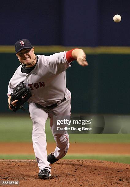 Starting pitcher Jon Lester of the Boston Red Sox delivers a pitch against the Tampa Bay Rays in game seven of the American League Championship...