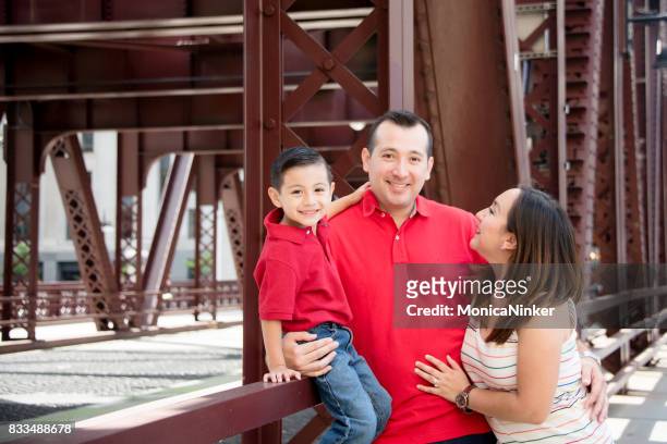 happy hispanic family - chicago lifestyle stock pictures, royalty-free photos & images