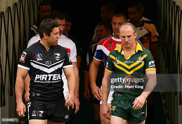 Kiwis captain Nathan Cayless and Kangaroos captain Darren Lockyer lead out the World Cup captains for a photo opportunity during a 2008 Rugby League...