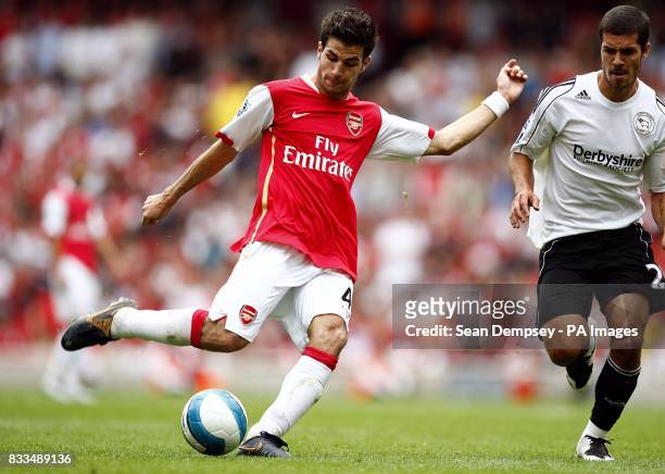 Arsenal's Francesc Fabregas scores the fourth goal of the game.