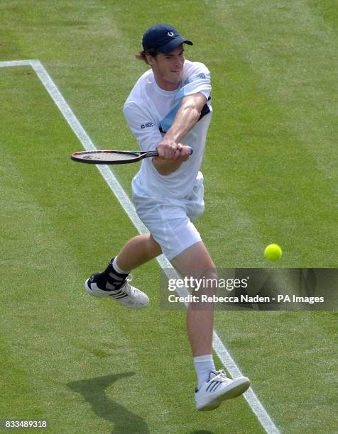 Andy Murray in action during the third day of the Davis Cup World Group Play-off at the All England Club, Wimbledon.