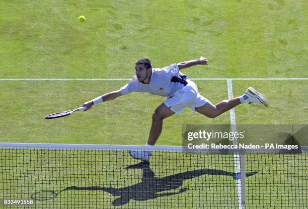 Croatia's Roko Karanusic in action against Andy Murray during the third day of the Davis Cup World Group Play-off at the All England Club, Wimbledon.