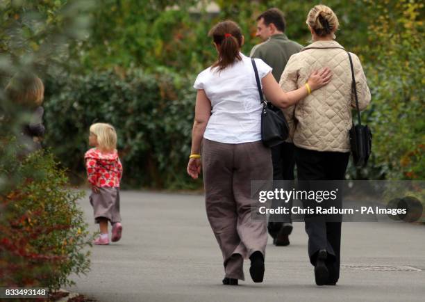 Kate and Gerry McCann, parents of missing four-year-old Madeleine, walk back to their home in Rothley, Leicestershire, with two-year-old twins Sean...