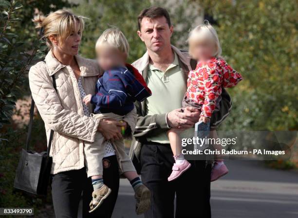 Kate and Gerry McCann, parents of missing four-year-old Madeleine, walk from their home in Rothley, Leicestershire, with two-year-old twins Sean and...