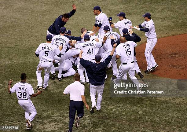 The Tampa Bay Rays celebrate after defeating the Boston Red Sox in game seven of the American League Championship Series during the 2008 MLB playoffs...