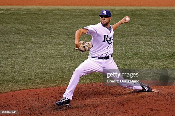 Relief pitcher David Price of the Tampa Bay Rays delivers a pitch against the Boston Red Sox in game seven of the American League Championship Series...