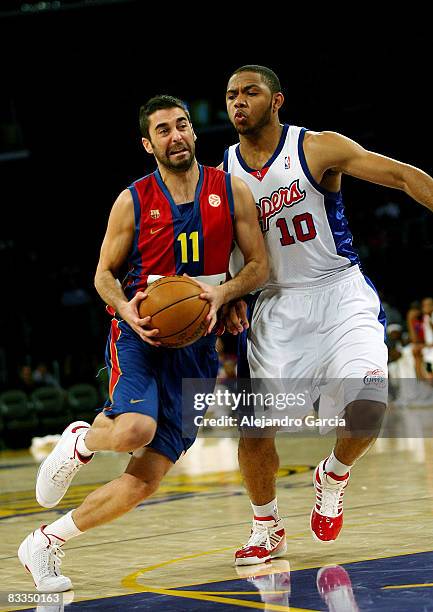 Of Regal FC Barcelona, Juan Carlos Navarro and of Los Angeles Clippers, Eric Gordon in action during the Euroleague Basketball American Tour match...