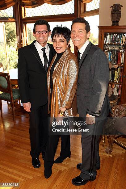 Liza Minnelli poses with Terrence Flannery and Michael Feinstein during their wedding ceremony held at a private residence on October 17, 2008 in Los...