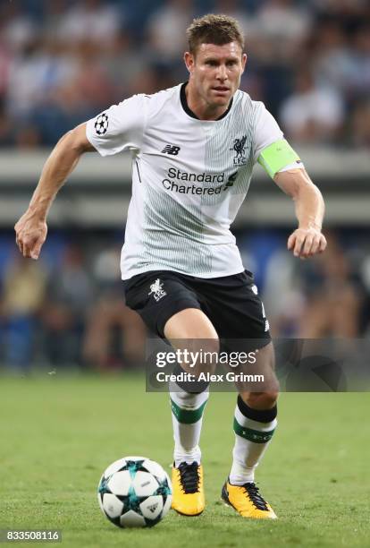 James Milner of Liverpool controles the ball during the UEFA Champions League Qualifying Play-Offs Round First Leg match between 1899 Hoffenheim and...