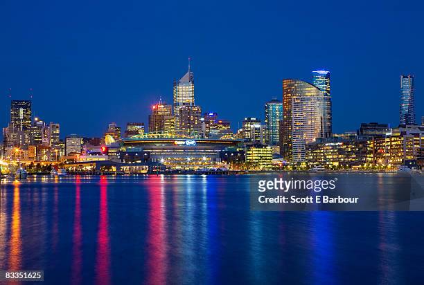 docklands and the melbourne city skyline. - docklands stadium melbourne stock pictures, royalty-free photos & images
