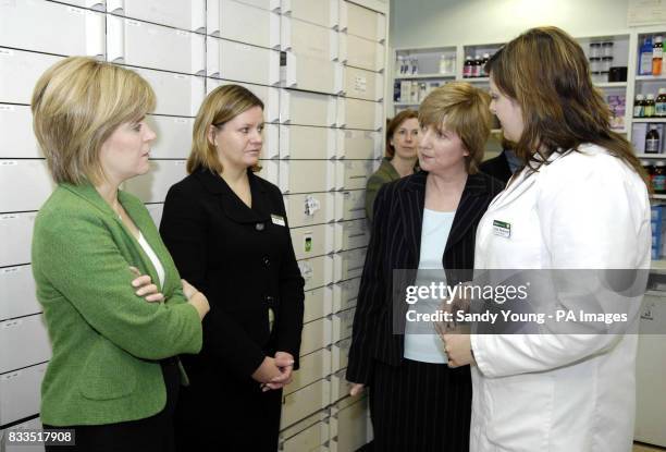 Photo. Scotland's Deputy First Minister for Health and Wellbeing, Nicola Sturgeon, on a visit to Lloyds pharmacy, Govan, Glasgow. From left to right,...