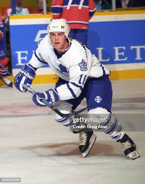 Darby Hendrickson of the Toronto Maple Leafs skates up ice against the Montreal Canadiens during NHL Preseason game action on September 22, 1995 at...