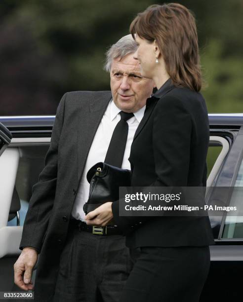 Colin McRae's father, Jimmy, and wife Alison arriving for the funeral of Colin McRae and son Johnny at East Chapel, Daldowie Crematorium.