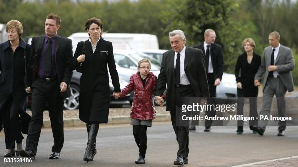 The McRae family Margaret , Stuart , Alison , daughter Hollie with Jimmy followed by Alister McRae, arrive at the funeral of former quad bike...