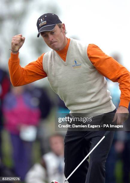 Continental Europe's Raphael Jacquelin celebrates after winning the match on the 16th green during day three of the Seve Trophy at The Heritage Golf...