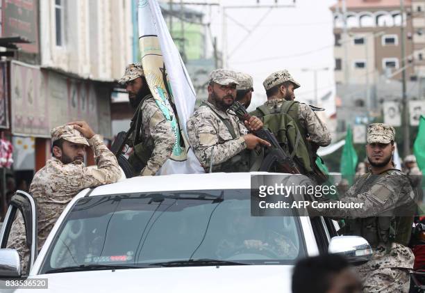 Hamas militants attend the funeral of Nidal al-Jaafari, a 28-year-old field commander who was killed overnight in a suicide attack that targeted...