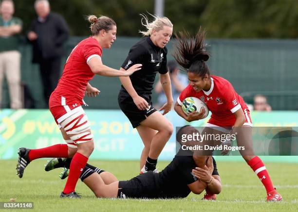 Magali Harvey of Canada is tackled during the Women's Rugby World Cup Pool A, match between Canada and New Zealand Black Ferns at Billings Park UCB...