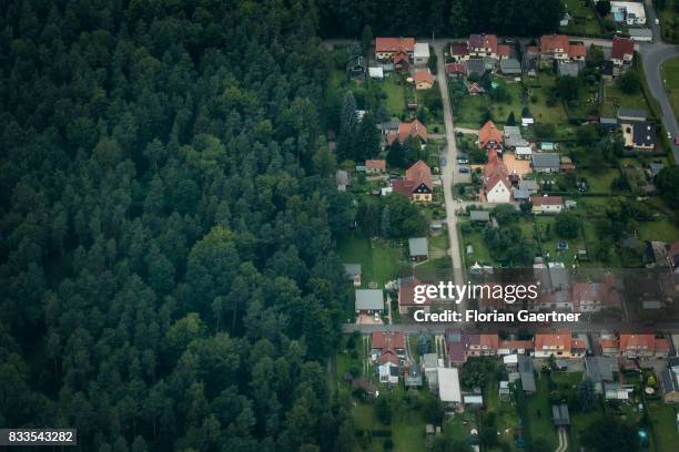 This aerial photo shows a housing estate next to a forest on August 04, 2017 in Dresden, Germany.