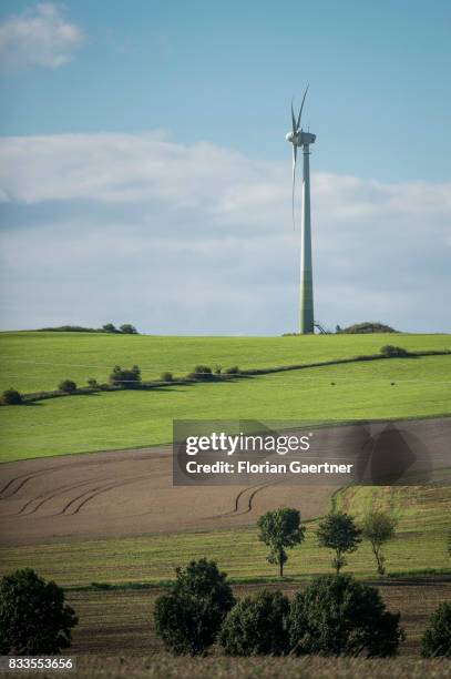 Wind power station on a hill is pictured on August 12, 2017 in Oberseifersdorf, Germany..