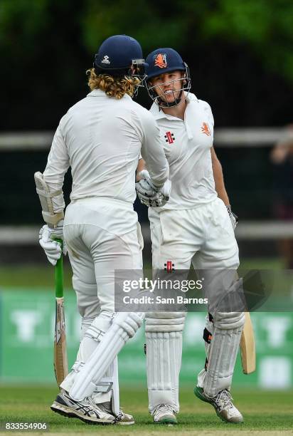 Dublin , Ireland - 17 August 2017; Logan van Beek of Netherlands, right, is congratulated by teammate Max O'Dowd, after hitting a half century during...