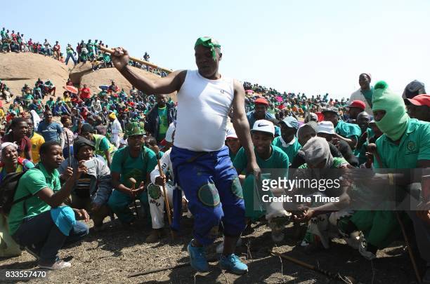 Association of Mineworkers and Construction Union members attend the fifth anniversary commemoration of the Marikana massacre at Wonderkop on August...