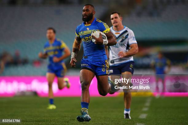 Semi Radradra of the Eels makes a break during the round 24 NRL match between the Parramatta Eels and the Gold Coast Titans at ANZ Stadium on August...