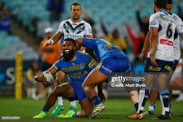 Michael Jennings of the Eels celebrates scoring a try, which was later disallowed during the round 24 NRL match between the Parramatta Eels and the...