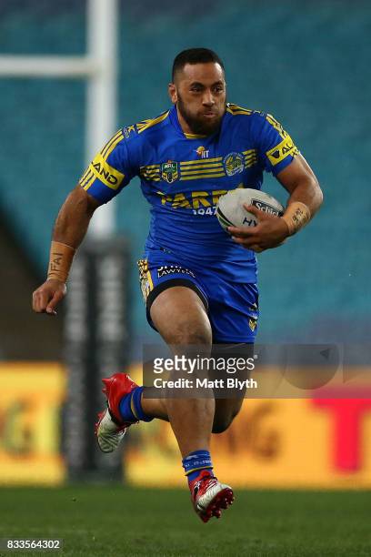 Suaia Matagi of the Eels runs the ball during the round 24 NRL match between the Parramatta Eels and the Gold Coast Titans at ANZ Stadium on August...