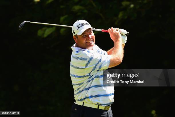 Michael Watson of Wessex Golf Centre plays his first shot on the 18th tee during the Golfbreaks.com PGA Fourball Championship - Day 2 at Whittlebury...