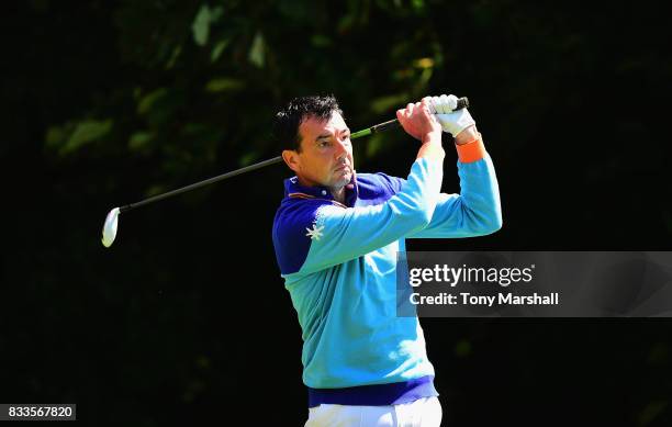 Richard O'Hanlon of St Kew Golf Club plays his first shot on the 18th tee during the Golfbreaks.com PGA Fourball Championship - Day 2 at Whittlebury...