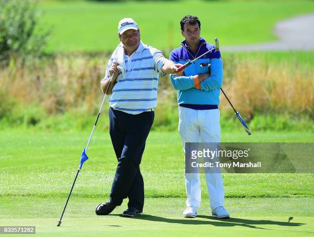 Michael Watson of Wessex Golf Centre and Richard O'Hanlon of St Kew Golf Club celebrate finishing their second round 9 under par during the...