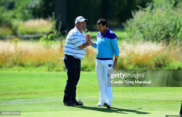 Michael Watson of Wessex Golf Centre and Richard O'Hanlon of St Kew Golf Club celebrate finishing their second round 9 under par during the...